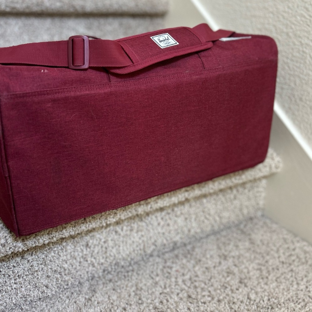 Herschel Supply Company Red Duffel Bag with strap Durable Travel Essential - Picture 8 of 11